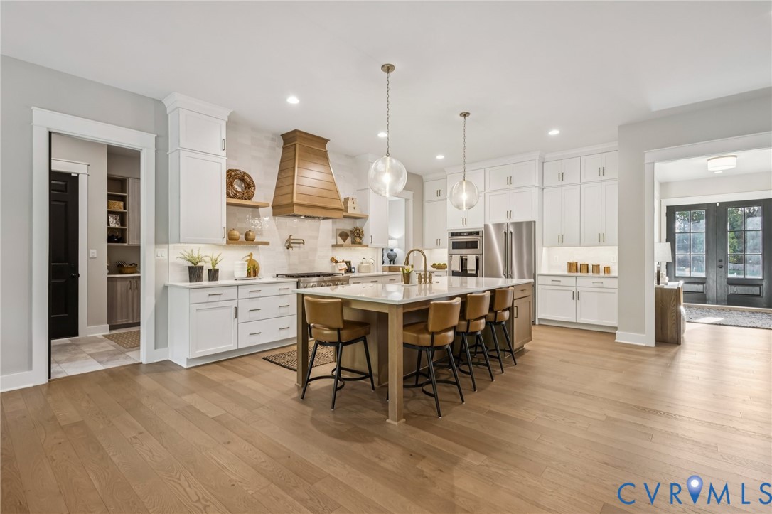 2 Rock Canyon Road Beaverdam, VA 23015 - Photo 12 of 31 a large kitchen with a table and chairs
