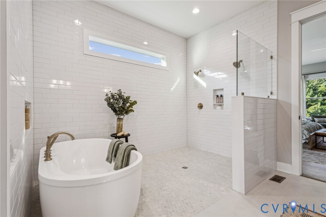 2 Rock Canyon Road Beaverdam, VA 23015 - Photo 22 of 31 a bathroom with a sink a shower and a mirror
