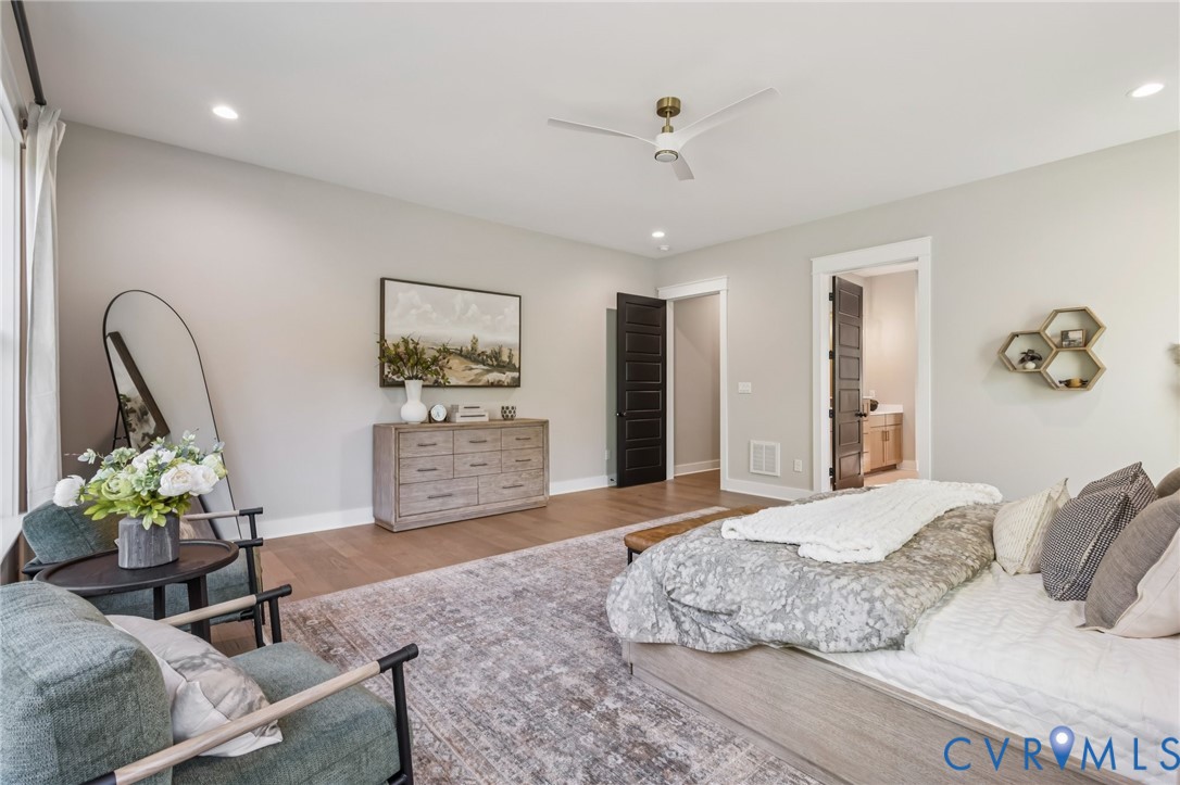 2 Rock Canyon Road Beaverdam, VA 23015 - Photo 26 of 31 a bedroom with a bed furniture and a potted plant