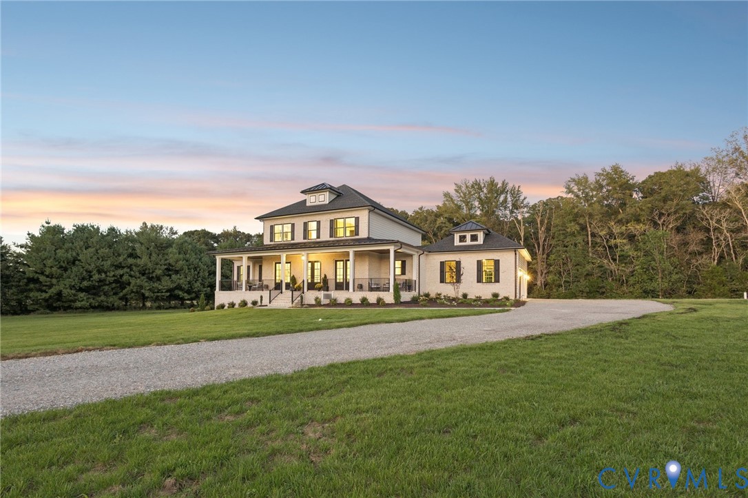 2 Rock Canyon Road Beaverdam, VA 23015 - Photo 3 of 31 a view of a big house with a big yard and large trees