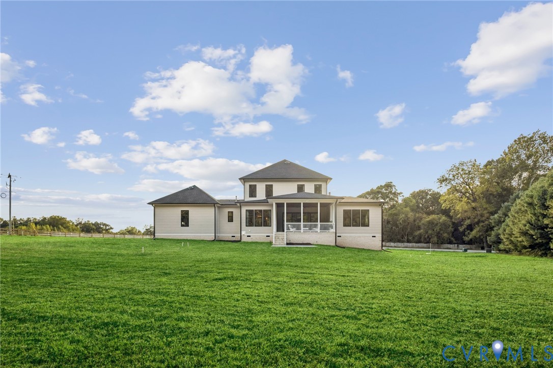 2 Rock Canyon Road Beaverdam, VA 23015 - Photo 6 of 31 a view of a house with a big yard and large trees