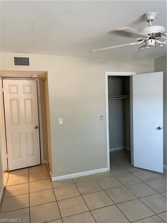 4290 Gulfstream Drive, Unit 9 Naples, FL 34112 - Photo 15 of 16 a view of an empty room
