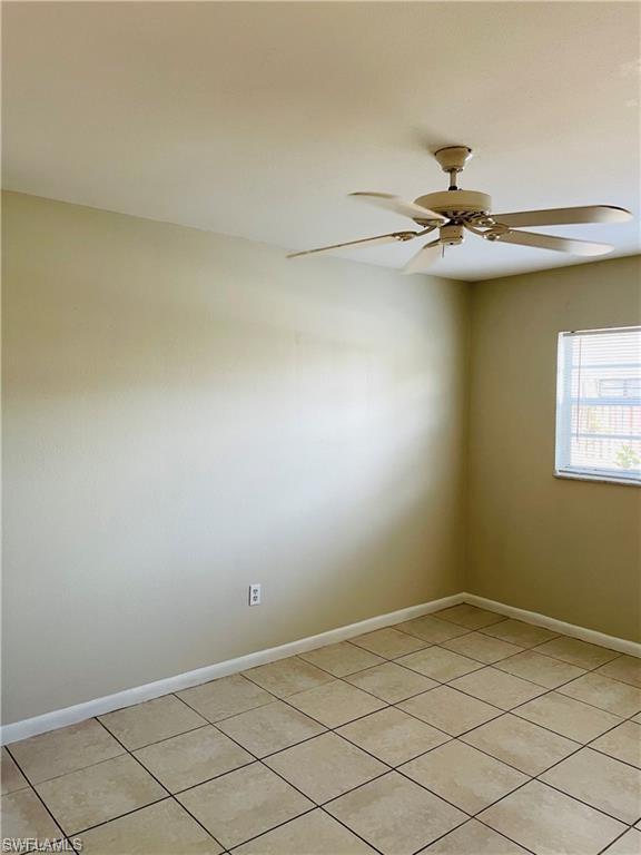 4290 Gulfstream Drive, Unit 9 Naples, FL 34112 - Photo 16 of 16 a view of a small space with wooden floor