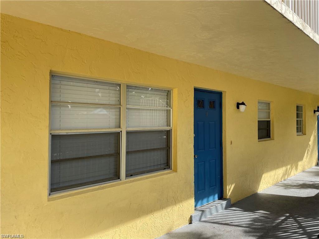 4290 Gulfstream Drive, Unit 9 Naples, FL 34112 - Photo 5 of 16 a view of front door