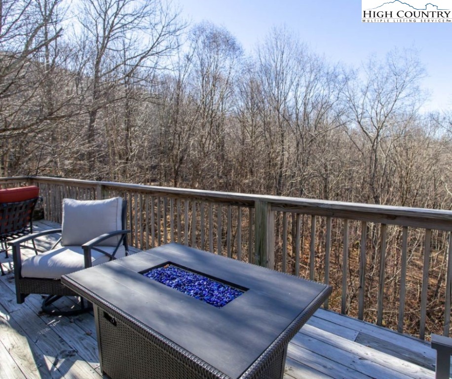 1534 Beech Mountain Parkway Beech Mountain, NC 28604 - Photo 11 of 29 a view of a balcony with furniture