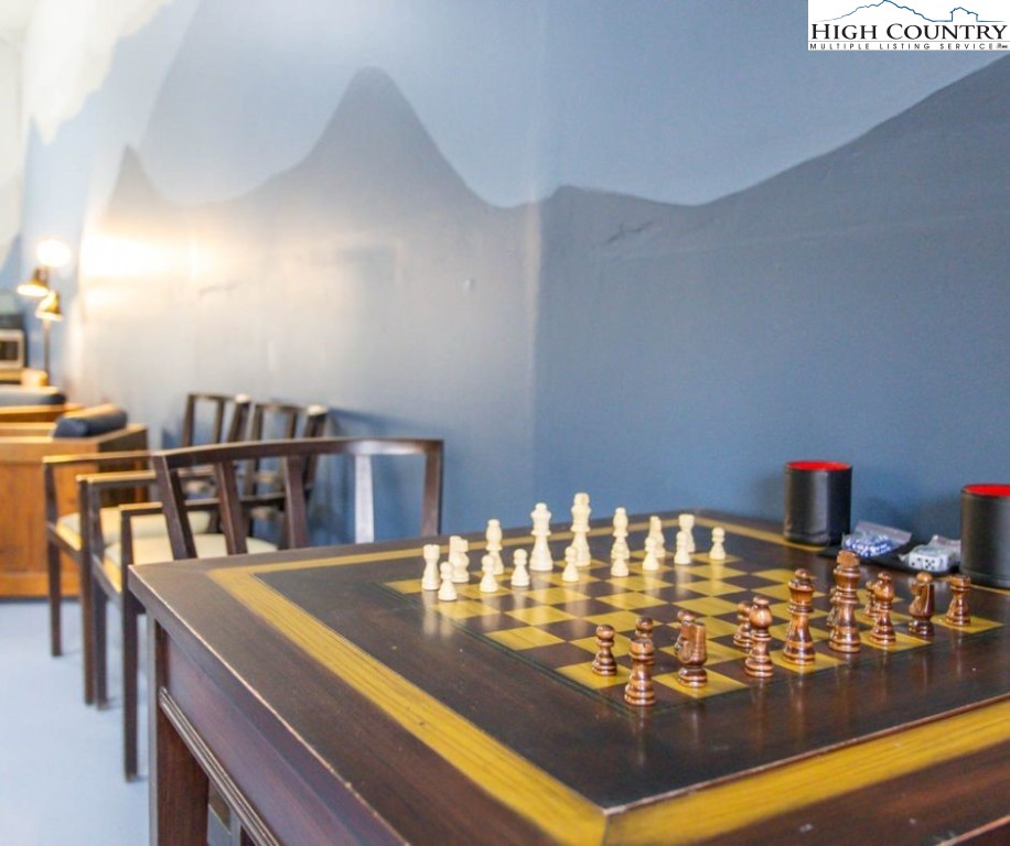 1534 Beech Mountain Parkway Beech Mountain, NC 28604 - Photo 24 of 29 a view of a dining room with furniture