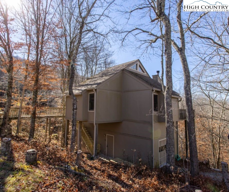 1534 Beech Mountain Parkway Beech Mountain, NC 28604 - Photo 29 of 29 a house is sitting in middle of forest