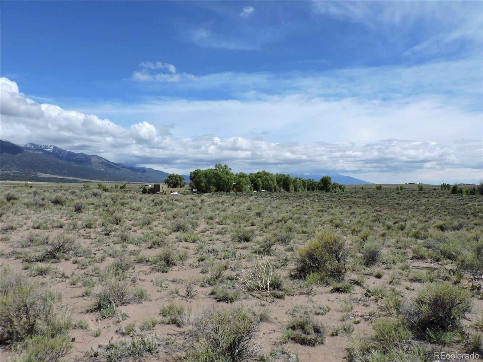 1189 Beaver Road Crestone, CO 81131 - Photo 5 of 6 a view of a bunch of trees and houses