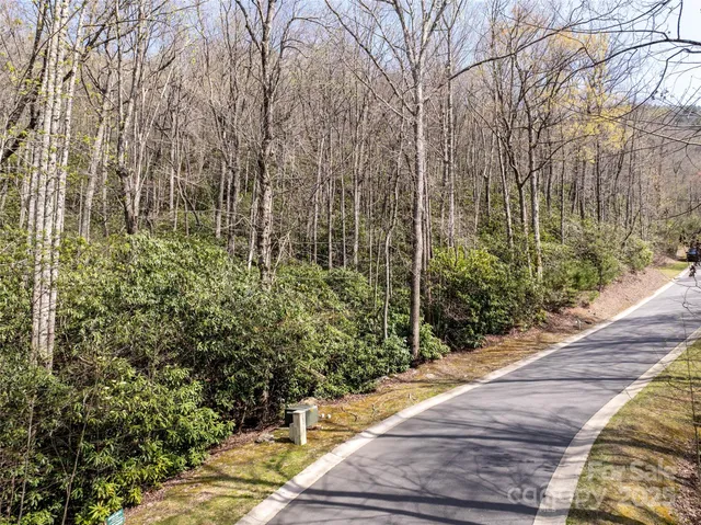 a view of a backyard of the house