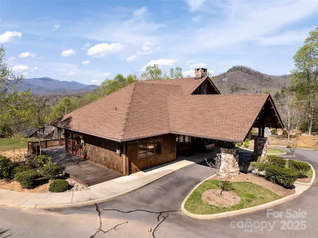 a view of a terrace with a table and chairs