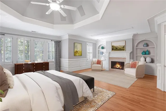a view of a cabinet with wooden floor and cabinet
