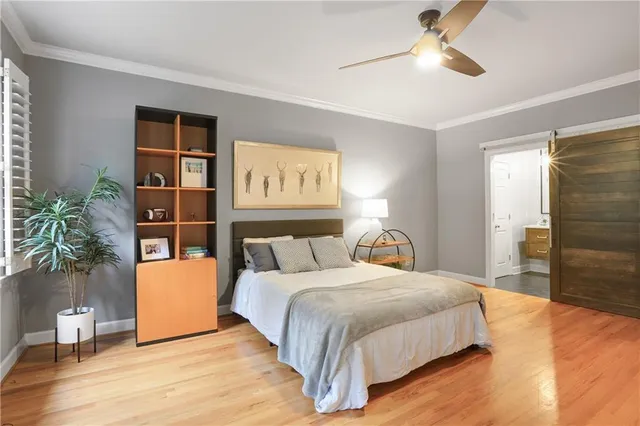 a very nice looking living room with furniture and floor to ceiling window