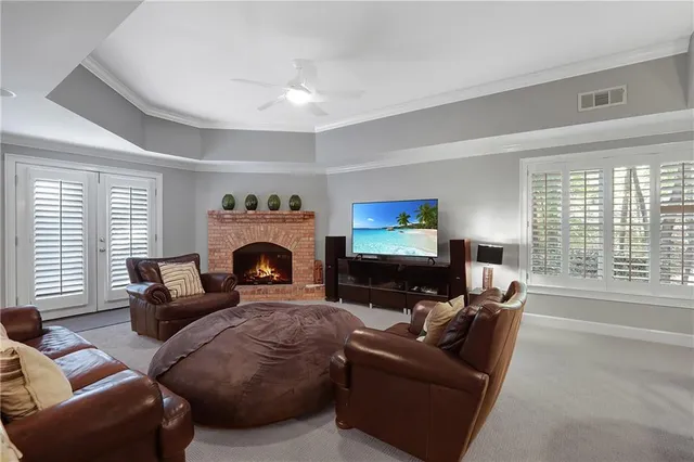 a view of a patio with a table chairs and a table