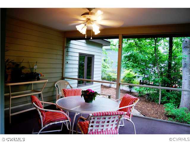 14313 Spring Gate Court Midlothian, VA 23112 - Photo 7 of 15 a view of a patio with a table chairs and a table