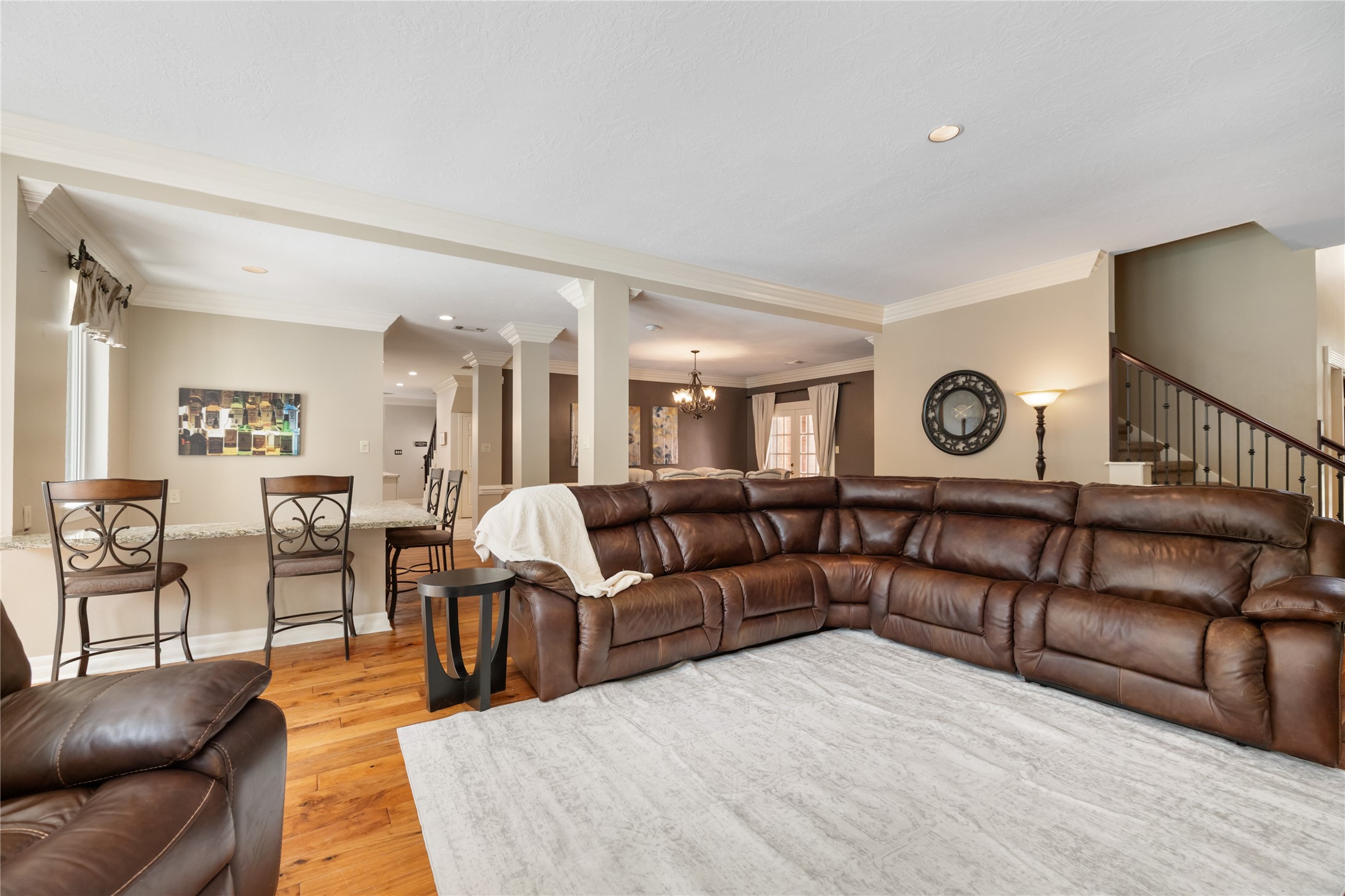 3106 Rustling Moss Drive Houston, TX 77068 - Photo 12 of 45 a living room with furniture and a clock