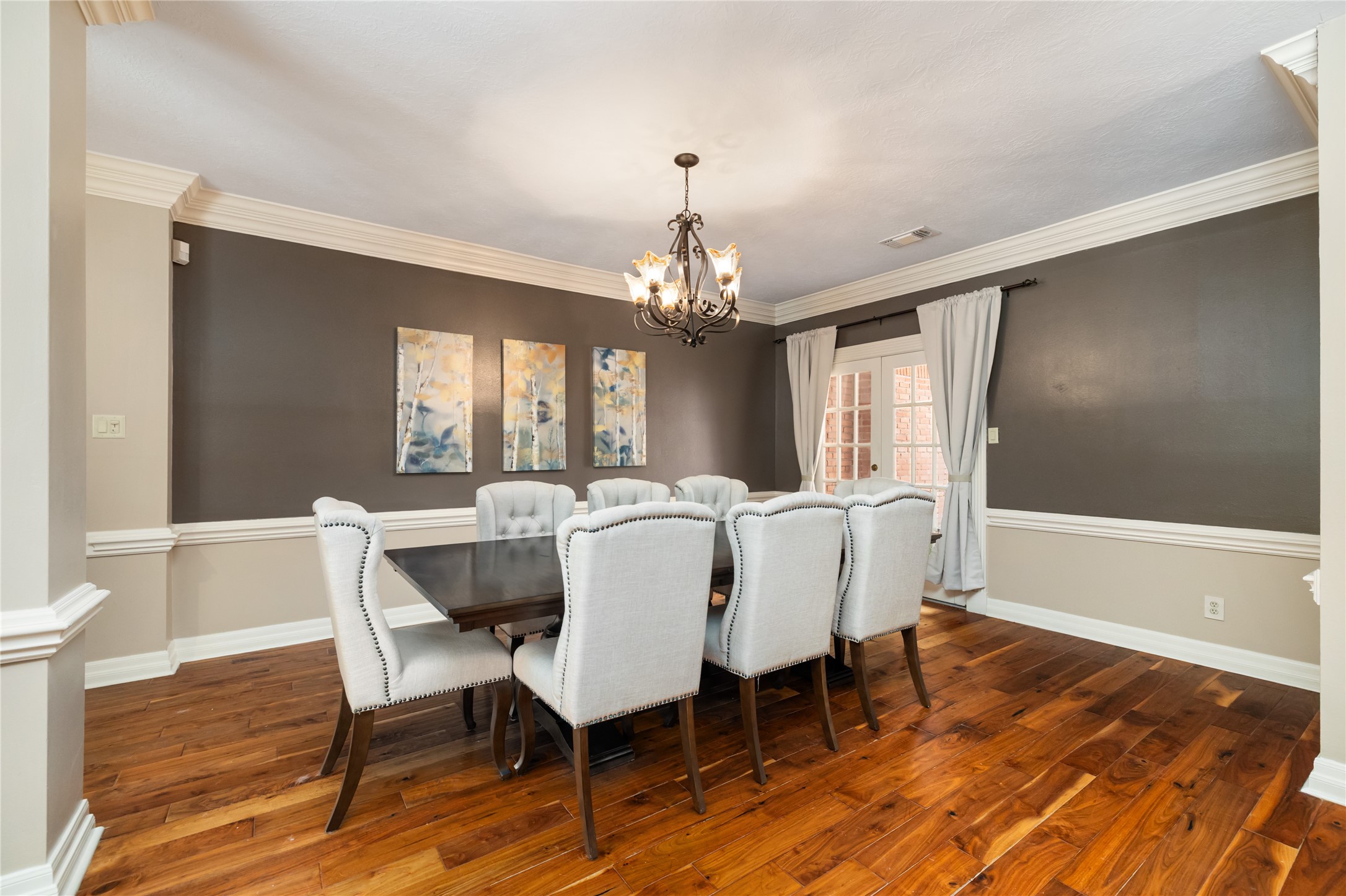 3106 Rustling Moss Drive Houston, TX 77068 - Photo 14 of 45 a view of a dining room with furniture window and wooden floor