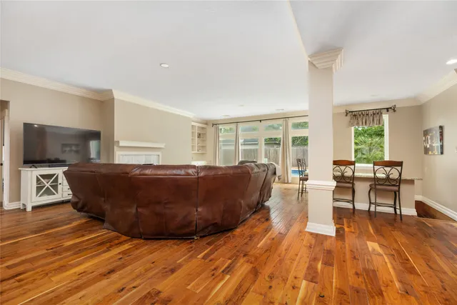 a living room with a couch and a flat screen tv