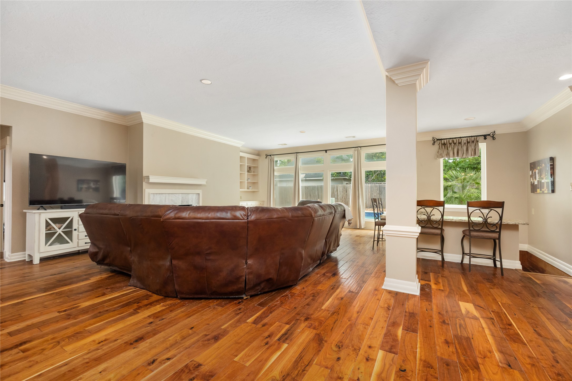 3106 Rustling Moss Drive Houston, TX 77068 - Photo 15 of 45 a living room with a couch and a flat screen tv