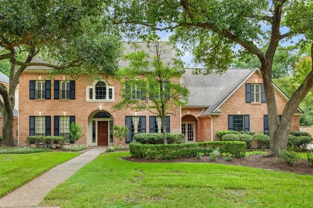 front view of a house and a yard