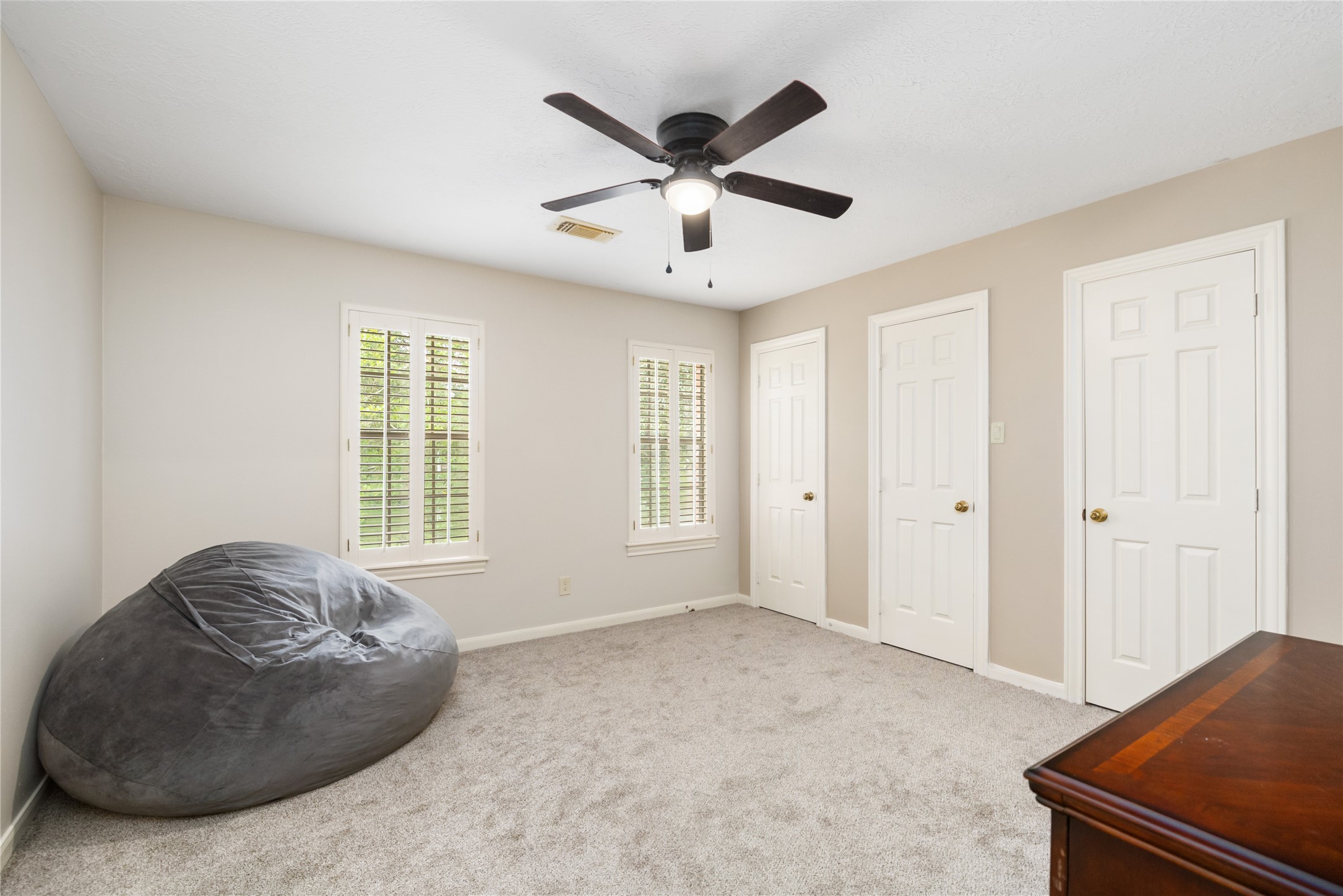 3106 Rustling Moss Drive Houston, TX 77068 - Photo 31 of 45 a living room with furniture and window with ceiling fan