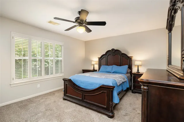 a bathroom with a sink vanity and mirror