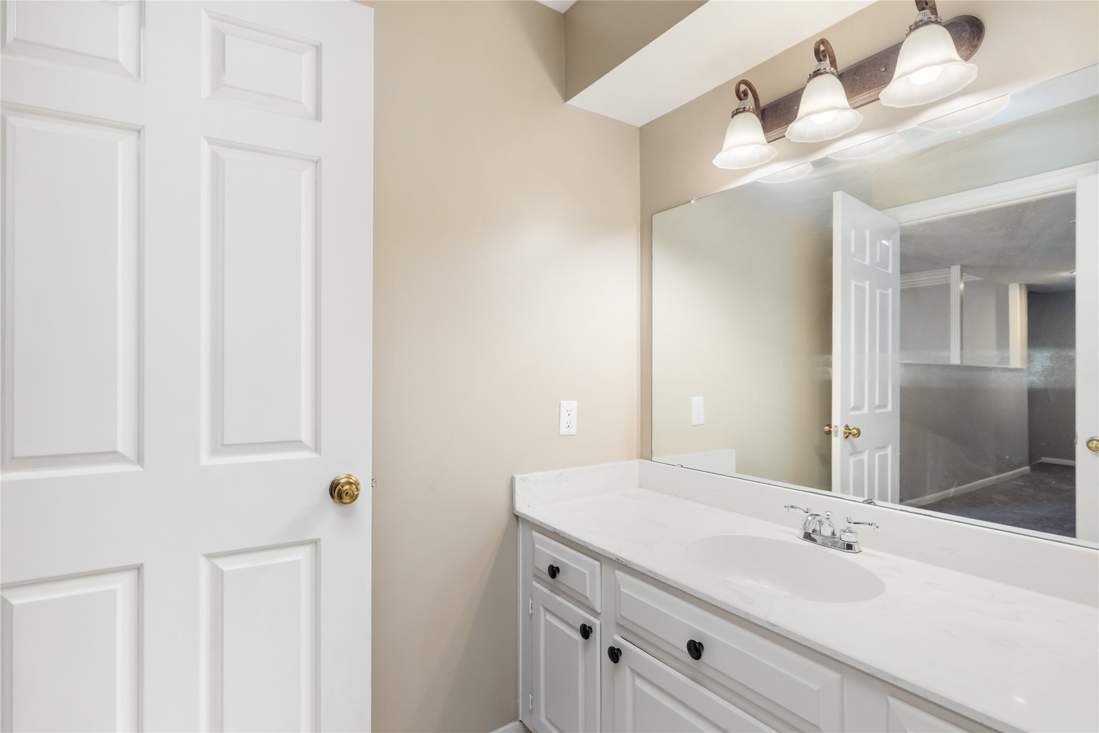 3106 Rustling Moss Drive Houston, TX 77068 - Photo 35 of 45 a bathroom with a sink and a mirror