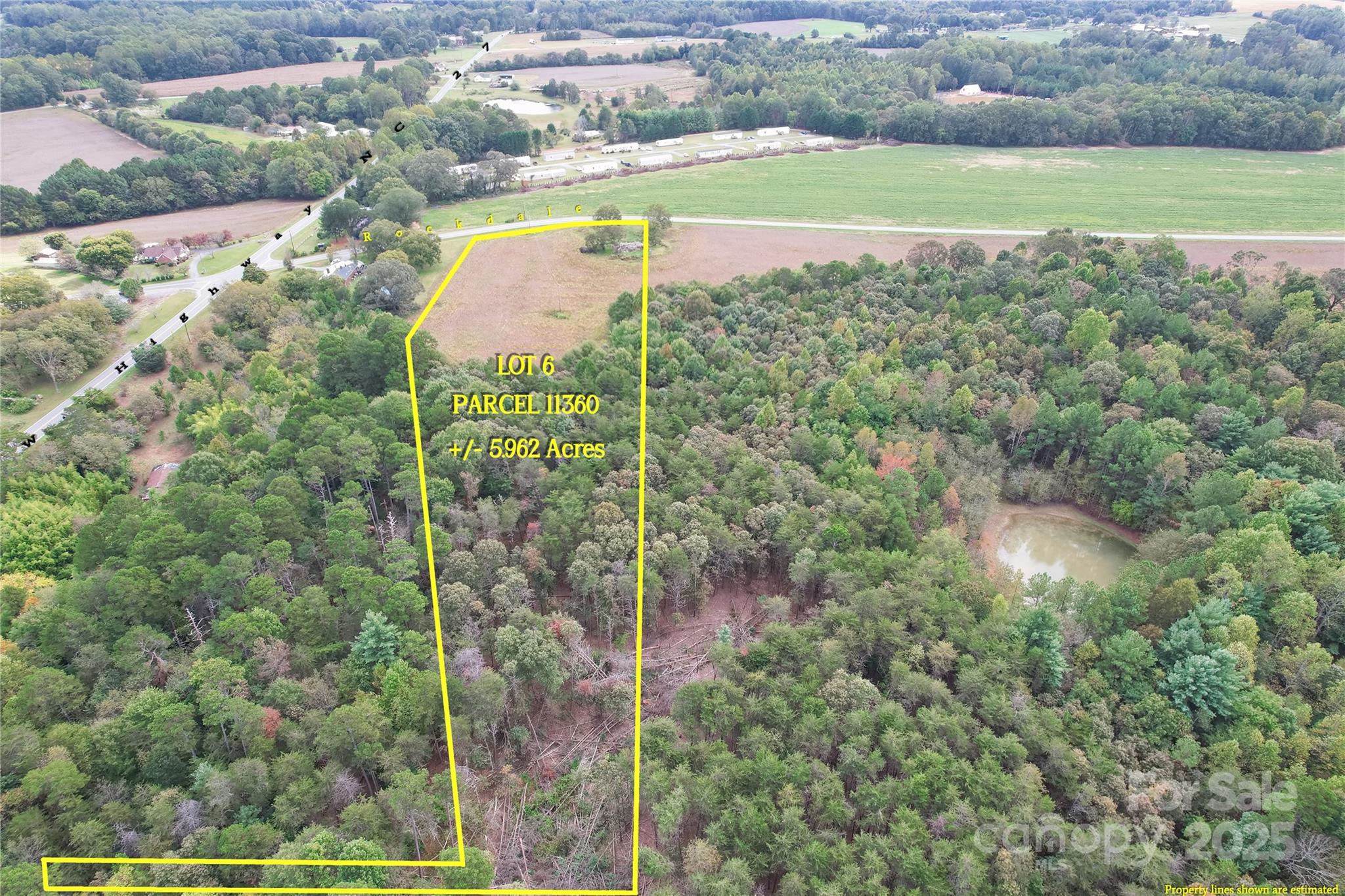 6 Rockdale Road Vale, NC 28168 - Photo 5 of 10 a view of a city with lush green forest