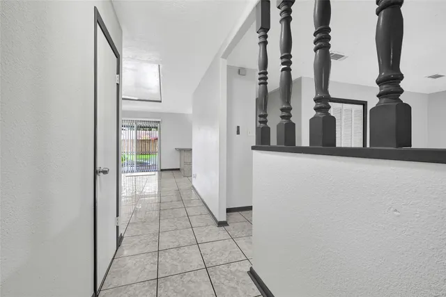 a view of a living room with entryway