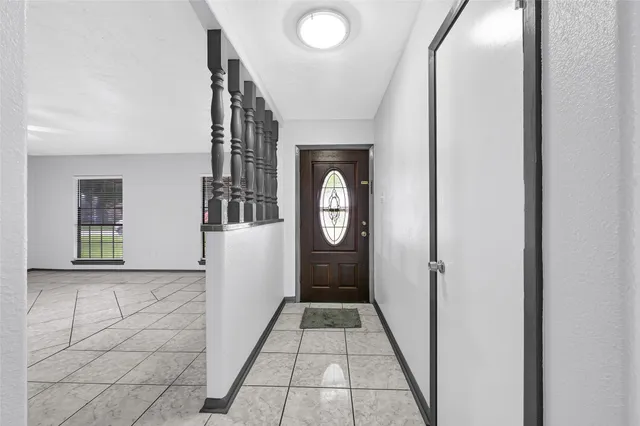 a view of entryway with a front door