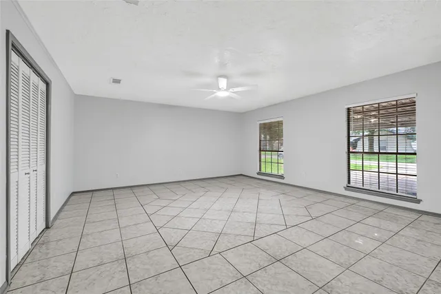 a view of an empty room and window