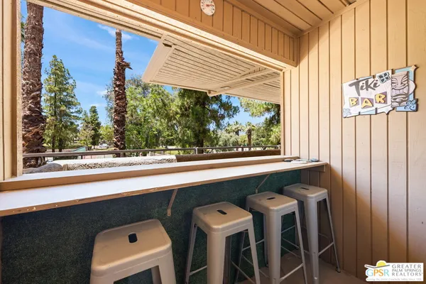 a kitchen with a window and a table