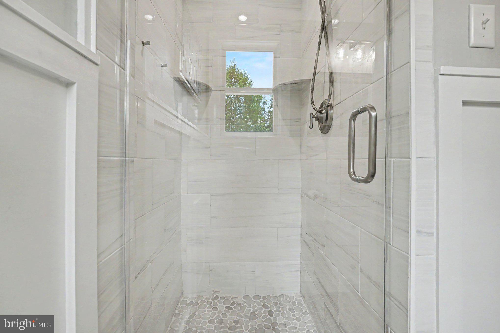 1912 Mare Road Warrington, PA 18976 - Photo 20 of 36 Sleek modern shower with natural light.