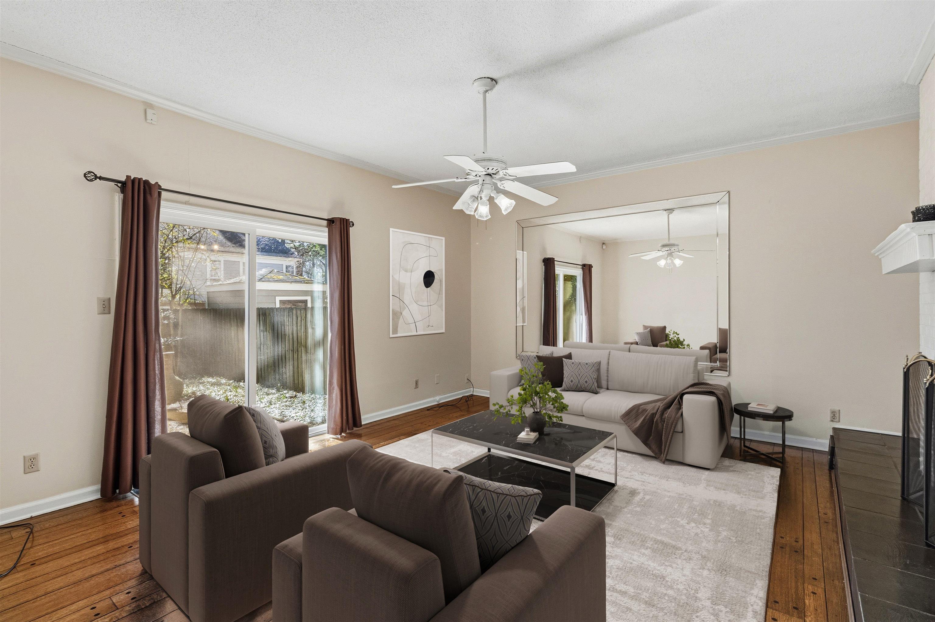 6905 Petworth Road, Unit 6905 Memphis, TN 38119 - Photo 19 of 32 a living room with furniture and a large window