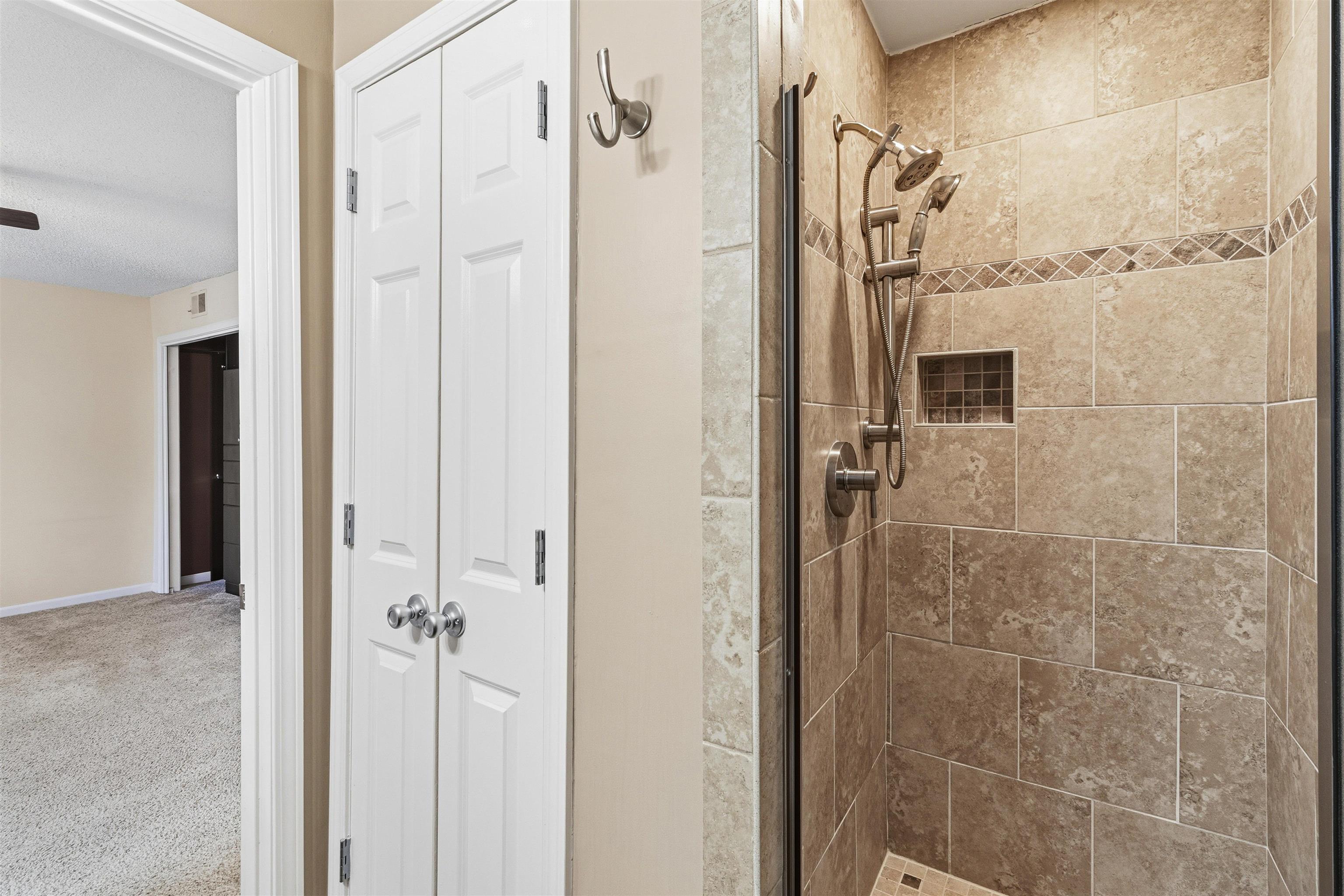 6905 Petworth Road, Unit 6905 Memphis, TN 38119 - Photo 23 of 32 a bathroom with a shower