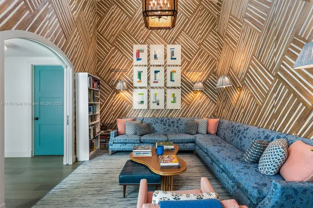 a living room with furniture and a rug