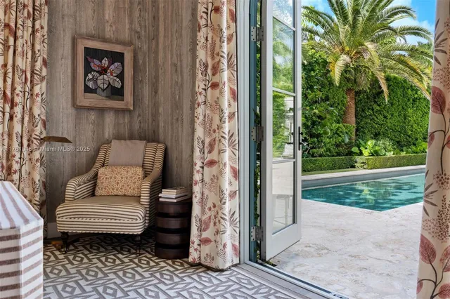 a couch sitting in front of a yard