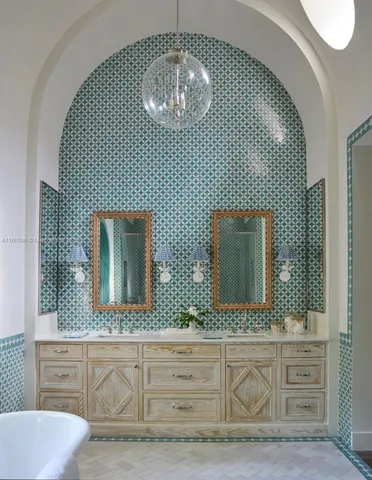 a bathroom with a double vanity sink and a mirror