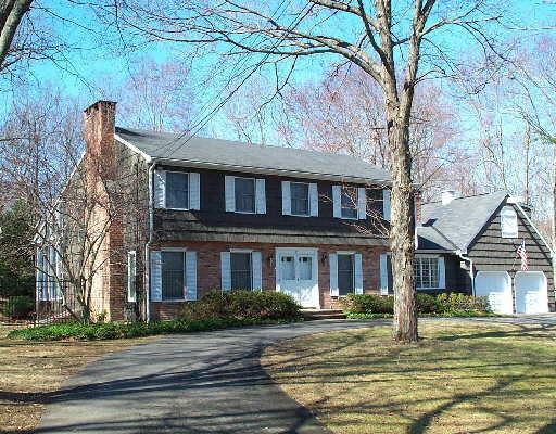 19 Lake Road Newtown, CT 06470 - Photo 1 of 1 a brick house that has a tree in front of it