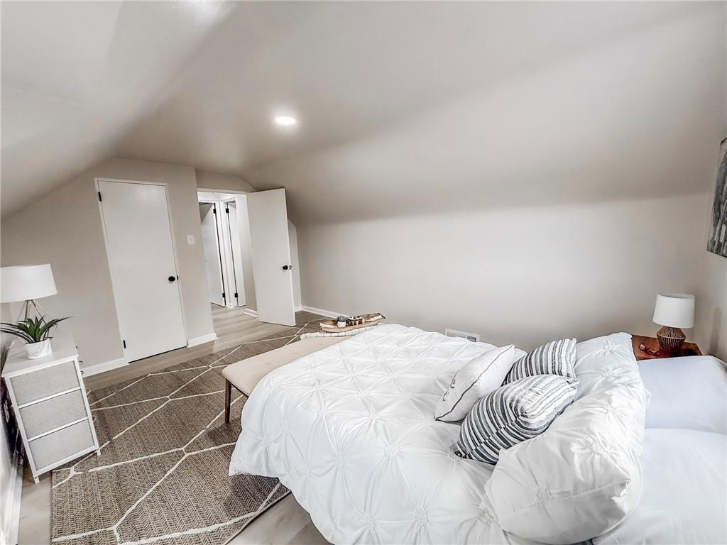 1529 Bower Hill Road Pittsburgh, PA 15243 - Photo 18 of 28 a bedroom with a bed and a cabinets