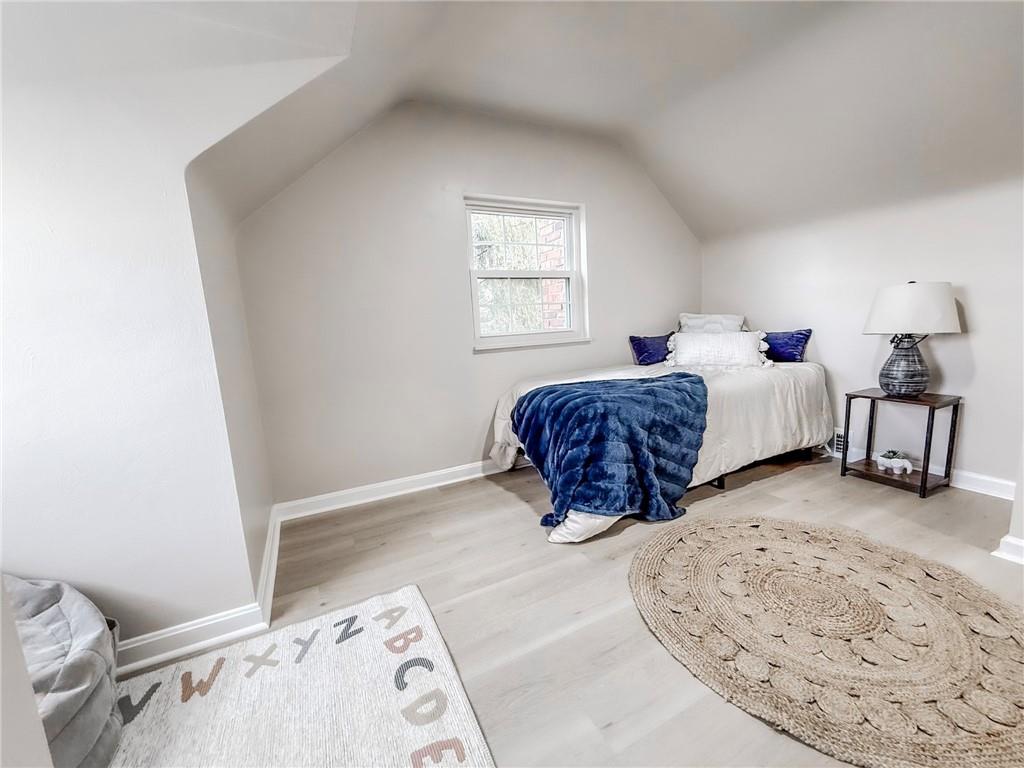 1529 Bower Hill Road Pittsburgh, PA 15243 - Photo 21 of 28 a spacious bedroom with two beds and painting on the wall