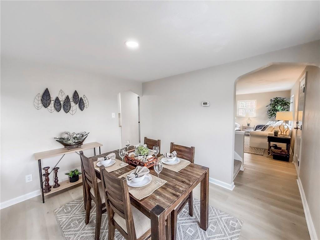 1529 Bower Hill Road Pittsburgh, PA 15243 - Photo 6 of 28 a view of a dining room with furniture and wooden floor