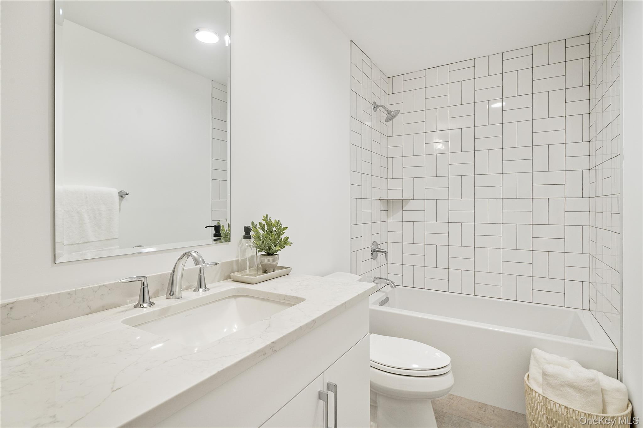2040 Crompond Road, Unit 19 Yorktown Heights, NY 10598 - Photo 15 of 18 a bathroom with a sink a toilet and shower