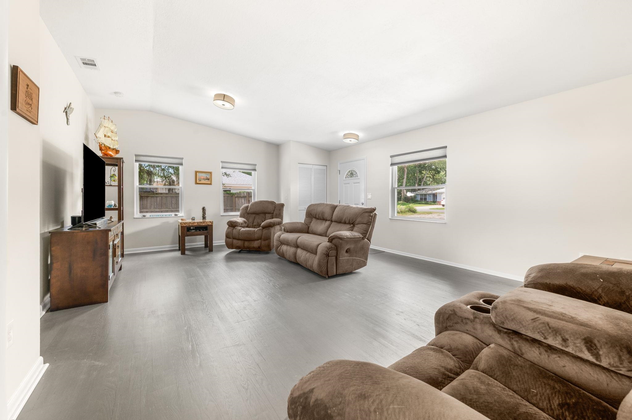 507 Gentian Road St. Augustine, FL 32086 - Photo 6 of 82 a living room with furniture and a flat screen tv