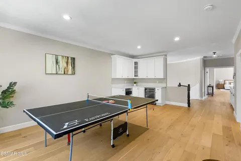 a spacious bedroom with a bed and a window