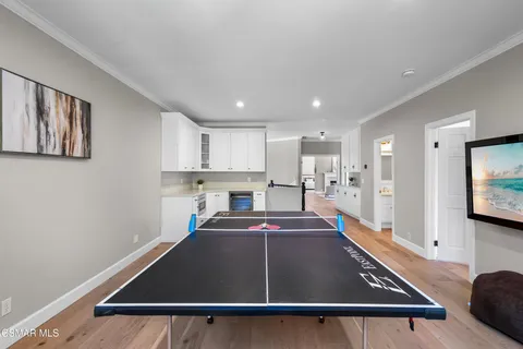 a bedroom with a bed and a fireplace