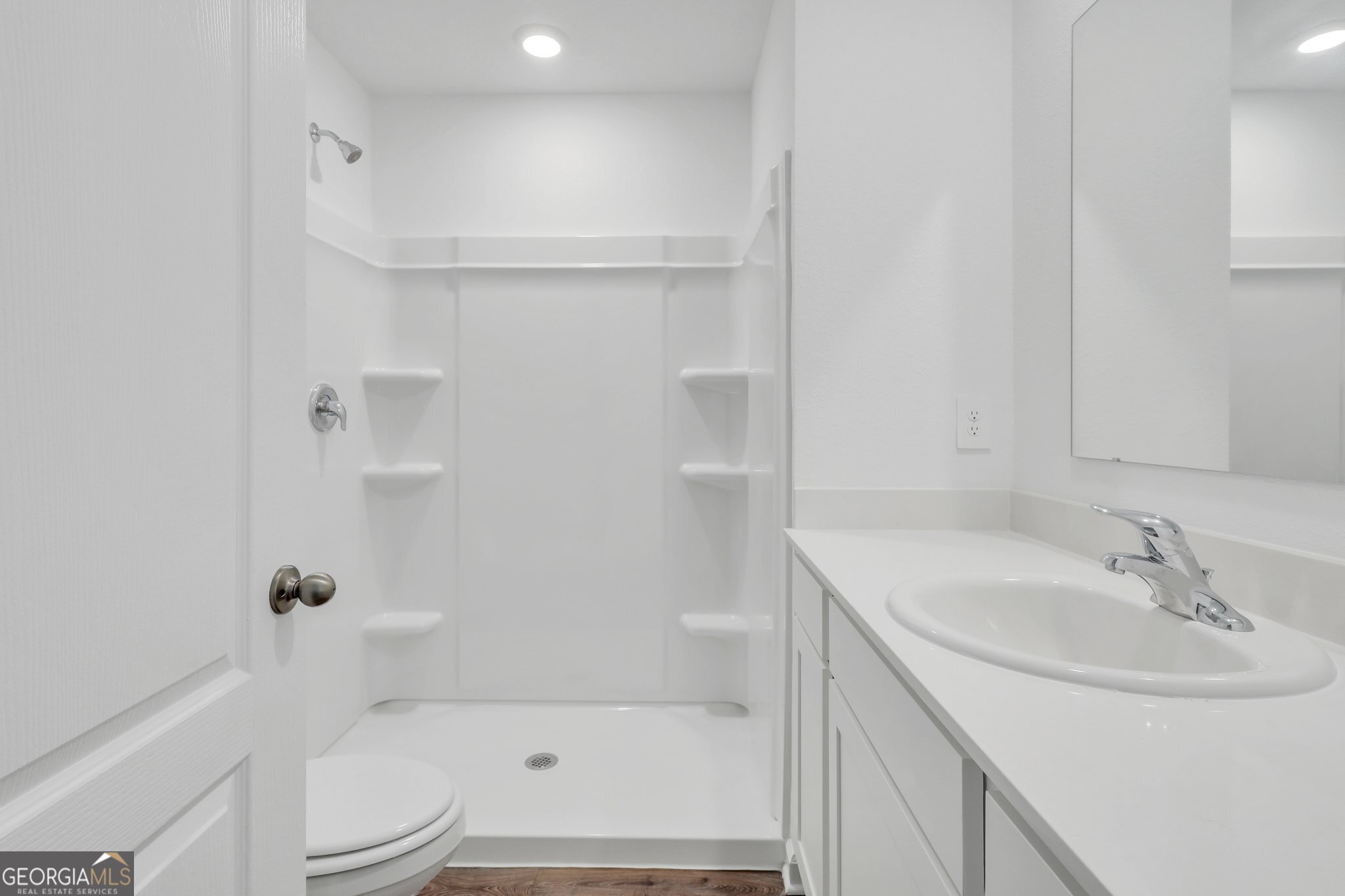 150 Inlet Reach Circle St. Marys, GA 31558 - Photo 17 of 27 a bathroom with a sink a toilet and shower
