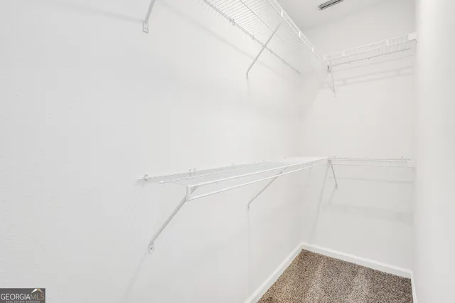 a view of small space with racks on the wall