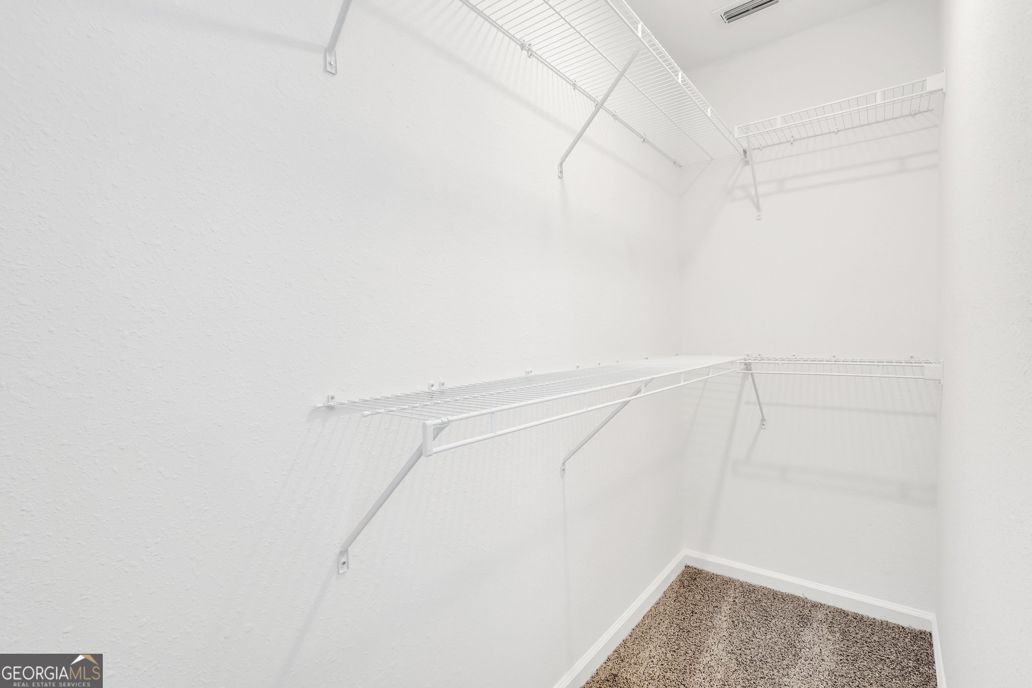 150 Inlet Reach Circle St. Marys, GA 31558 - Photo 20 of 27 a view of small space with racks on the wall