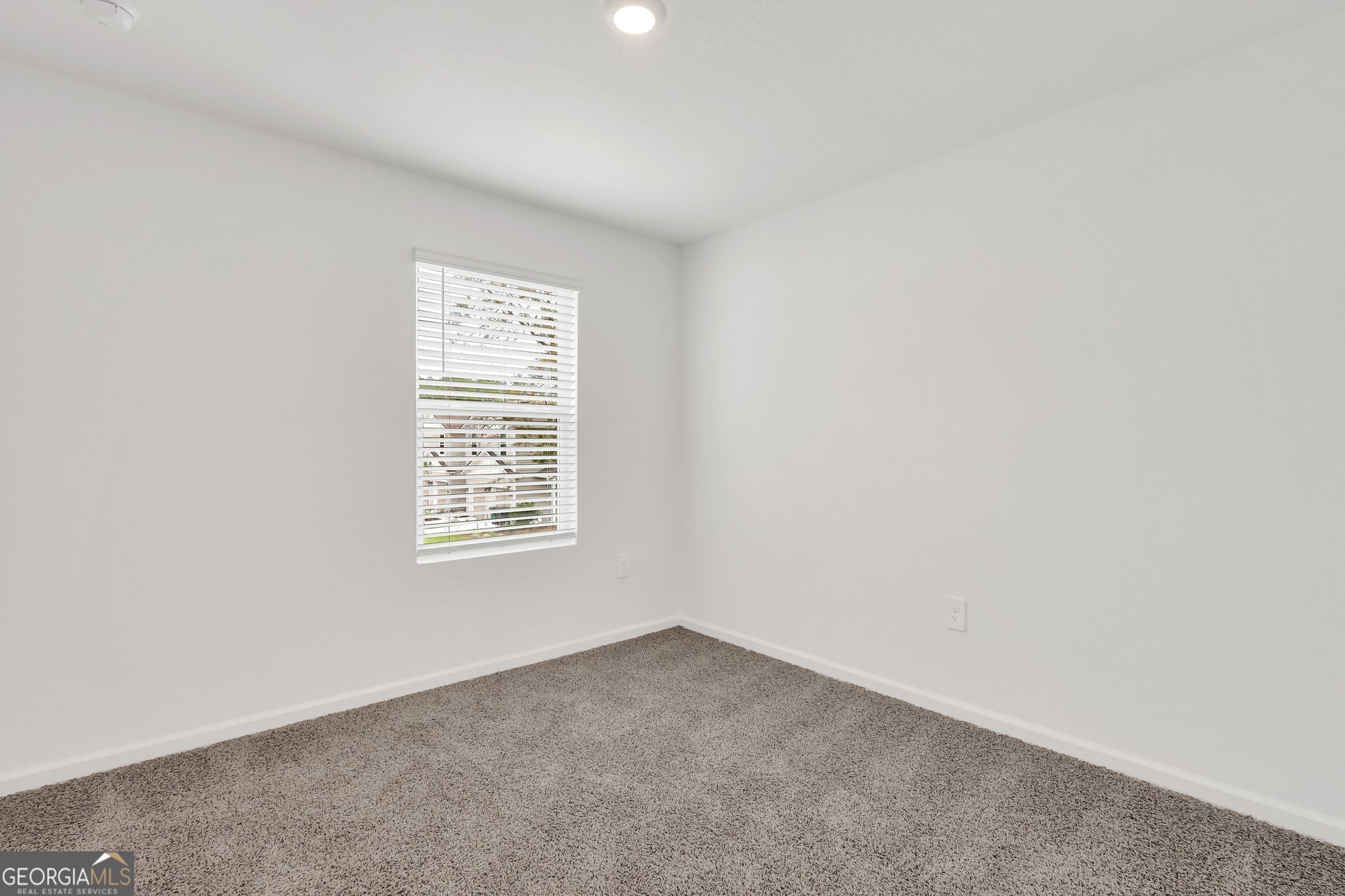 150 Inlet Reach Circle St. Marys, GA 31558 - Photo 23 of 27 an empty room with a window