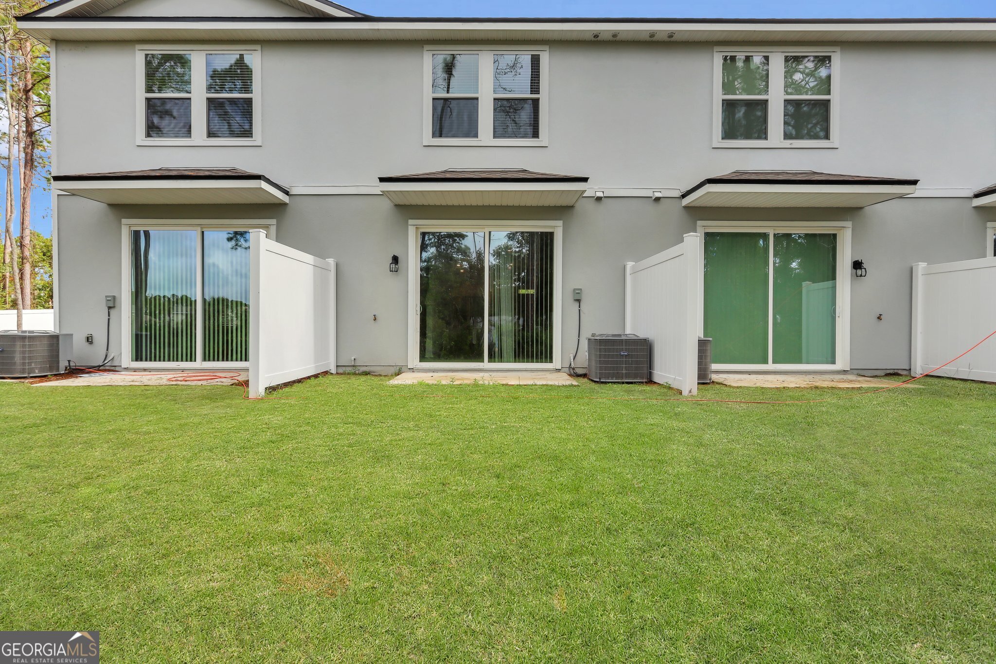 150 Inlet Reach Circle St. Marys, GA 31558 - Photo 26 of 27 front view of a brick house with a large windows